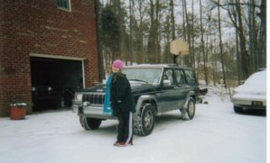 Lauren with jeep in snow.jpg