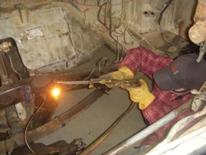 Cutting old mount off.jpg