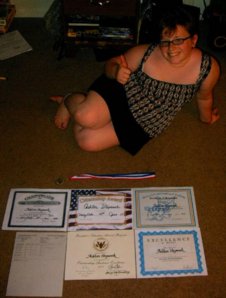 Ashton and all of her awards.jpg